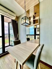 Modern dining room with open view and elegant furnishings
