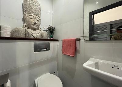 Modern bathroom with Buddha statue decoration