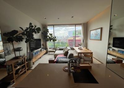 Spacious living room with natural light and city view