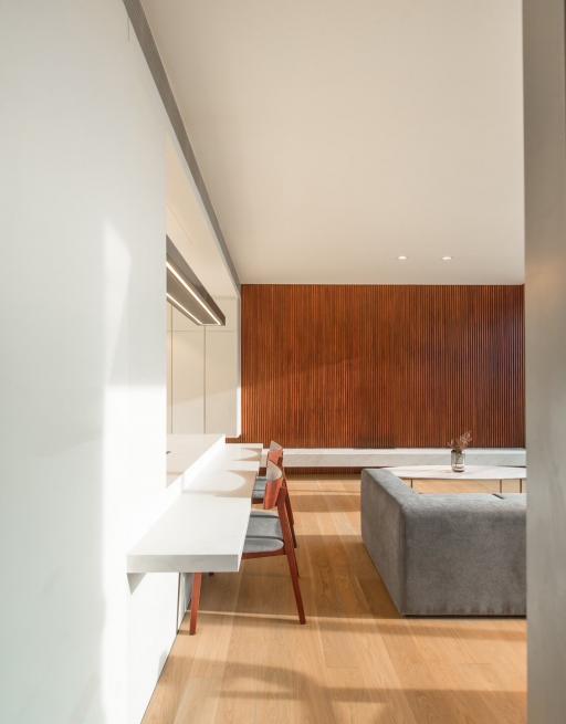 Modern dining room with wooden accents and natural lighting