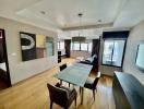 Spacious living room with dining area and modern decor