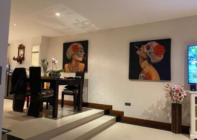 Elegant living room with modern decor and artwork