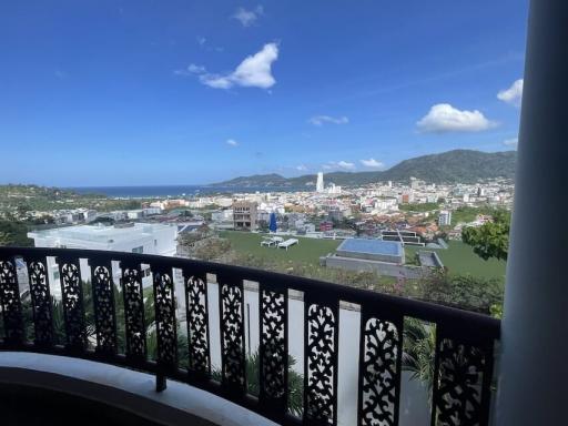 Spacious balcony with panoramic city and mountain view