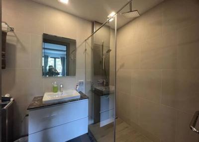 Modern bathroom with glass shower and vanity