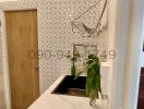 Modern kitchen interior with geometric pattern wallpaper and wooden elements