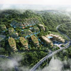 Aerial view of a modern eco-friendly residential complex with abundant greenery
