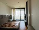 Spacious living room with city view and natural light