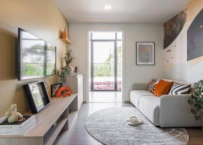 Modern living room with large window and contemporary decor