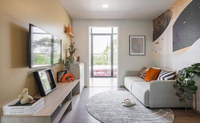 Modern living room with large window and contemporary decor