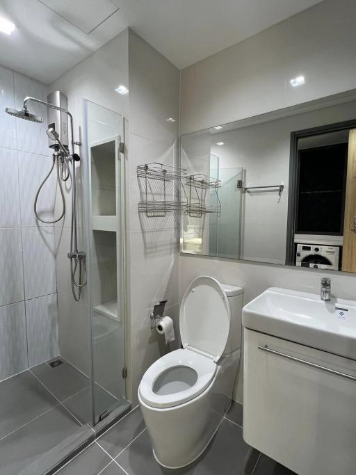 Modern bathroom interior with shower and toilet