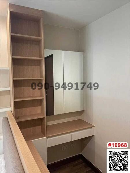 Modern bedroom with built-in wardrobe and wooden shelving