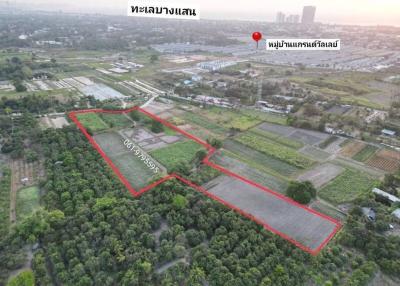 Aerial view of a large plot of land available for development