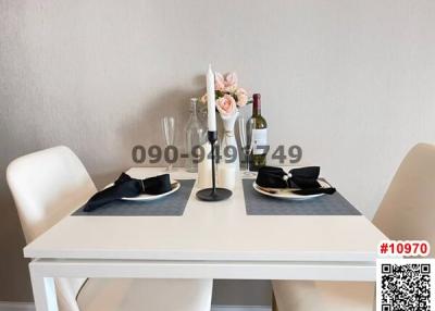 Modern dining area setup with table set for two