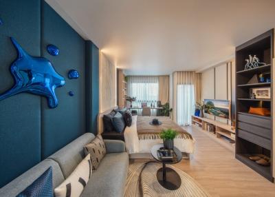 Elegant living room with contemporary design and vibrant blue wall accents