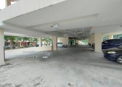 Spacious covered parking area in a residential building
