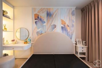 Stylish modern bedroom interior with artistic wall decor