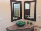 Modern bathroom with a double vanity and vessel sinks