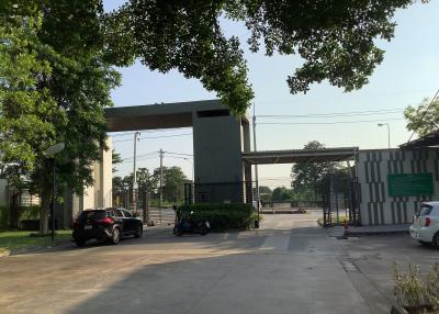 Guarded entrance of a residential complex with parking space