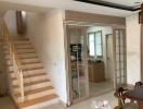 Interior of a home showing staircase and dining area