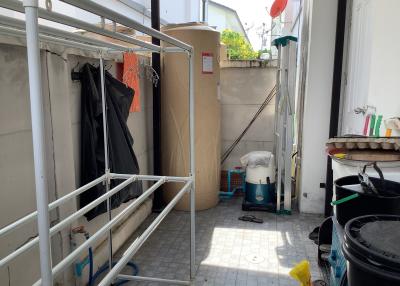 Utility and laundry space with storage options in a residential property