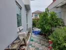 Residential home side yard with garden space