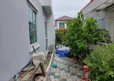 Residential home side yard with garden space