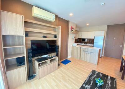 Modern living room with open-plan kitchen