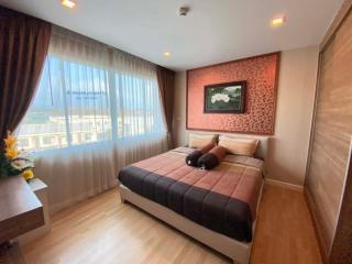 Cozy bedroom with ample natural light and modern decor