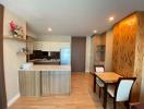 Modern kitchen and dining area with warm lighting