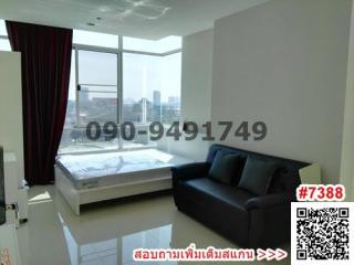 Modern bedroom with large window and city view
