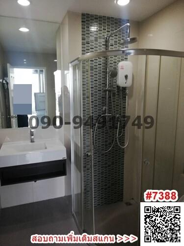 Modern bathroom with glass shower and vanity