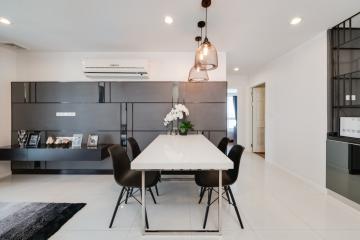 Modern dining and kitchen area with open floor plan