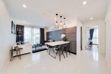 Modern open-plan living room with dining area