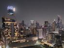 Stunning night view of a bustling cityscape with illuminated buildings