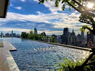 Luxurious rooftop pool overlooking city skyline