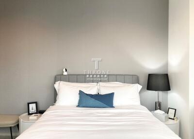 Elegant modern bedroom with neutral color palette and tidy arrangement