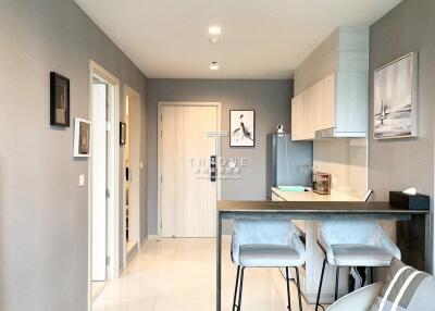 Modern kitchen with integrated dining area and sleek design