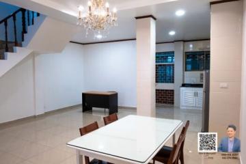 Spacious dining area with modern chandelier and open concept layout