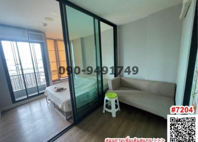 Modern bedroom interior with glass partition and balcony access