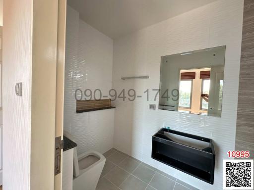 Modern bathroom with elegant fixtures and natural light