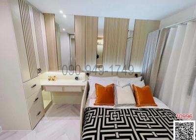 Modern bedroom with built-in wardrobe and stylish decor