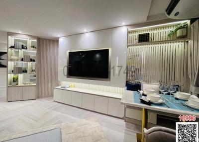 Modern living room interior with dining area and television