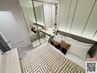 Modern bedroom interior with mirrored wardrobe and elegant decor