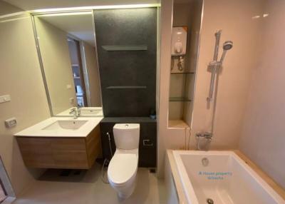 Modern bathroom with walk-in shower and vanity