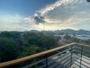 Spacious balcony with a scenic view of hills and natural landscapes