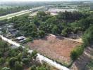 Aerial view of a spacious land plot ready for development