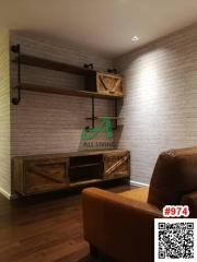 Cozy living room corner with modern wall shelving and warm lighting