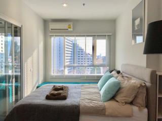 Contemporary bedroom with ample natural light from window