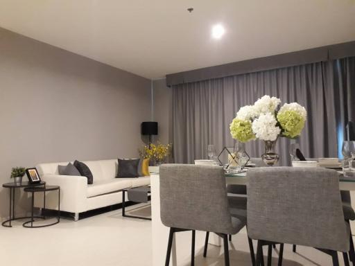 Modern and elegant living room with dining area