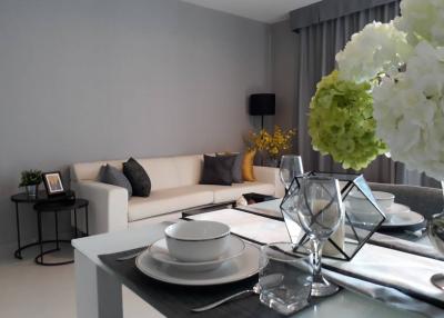 Elegant living room with modern dining setup